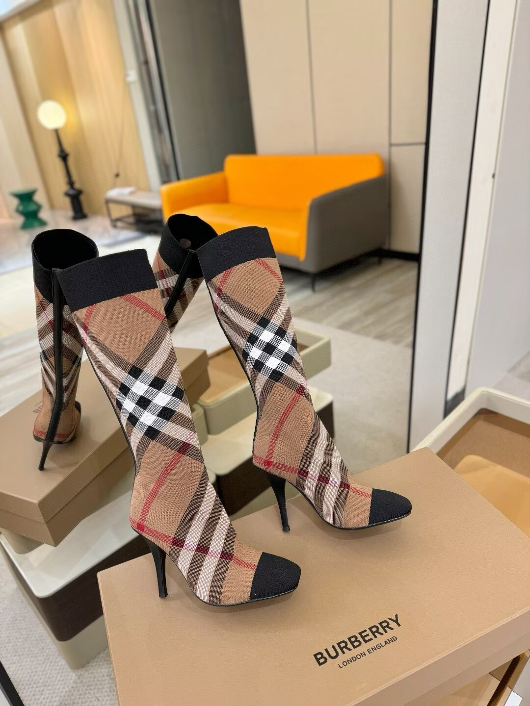 ua B**rry check high boots