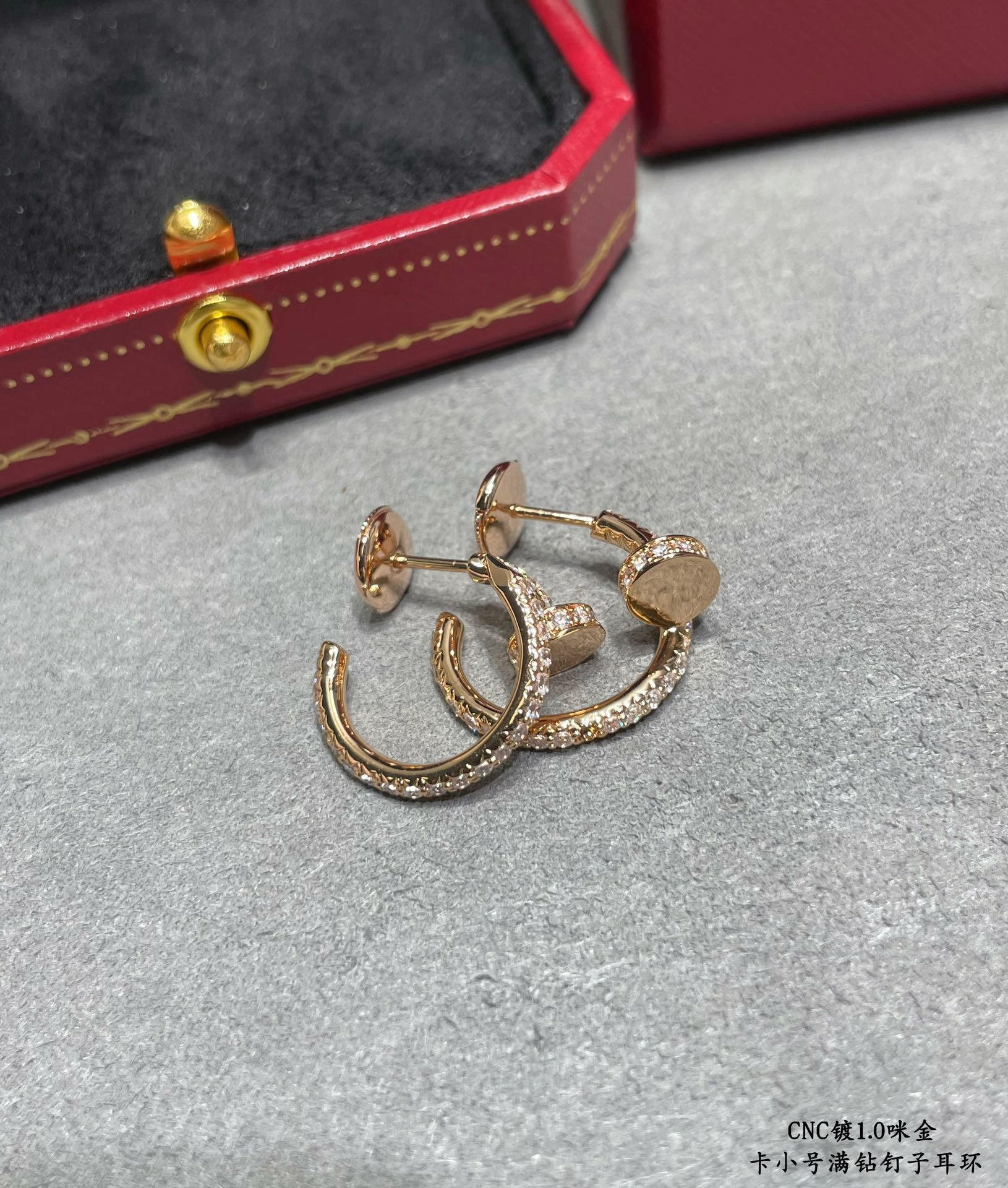 Ca*t*er Fully diamond-encrusted small nail Earrings