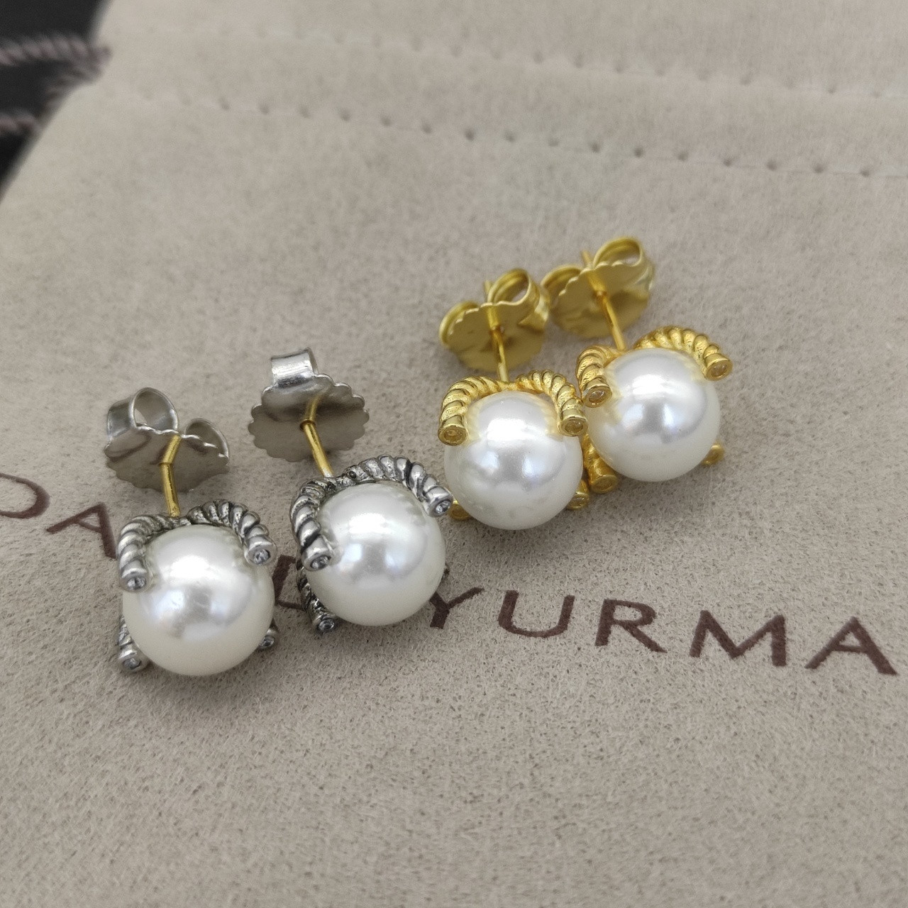 dau1d Yvrm*n four claw peal earrings