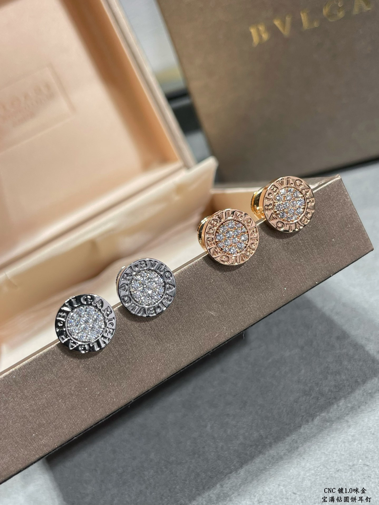 B*l*ai Diamond round cake Earrings