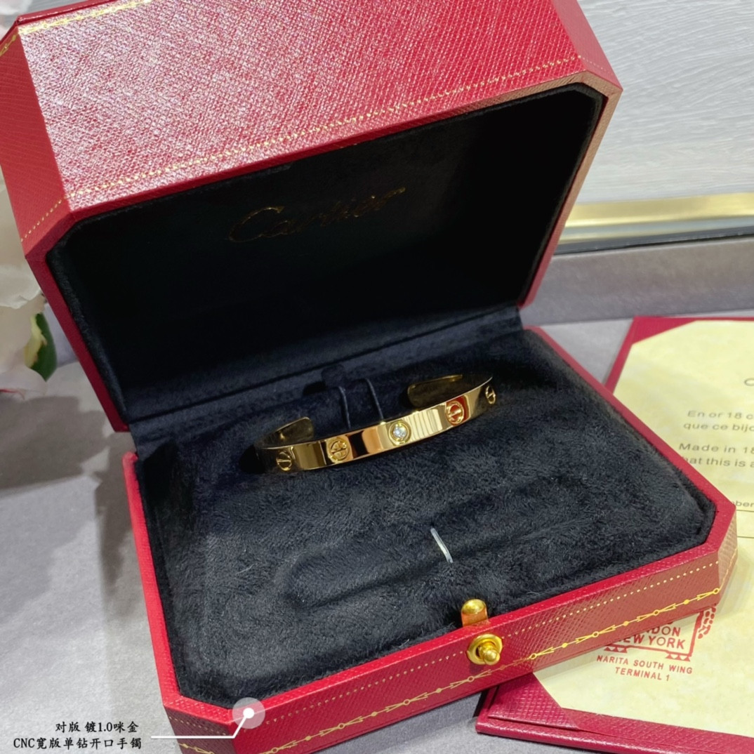 Ca*t*er wide single diamond open LOVE Bracelet