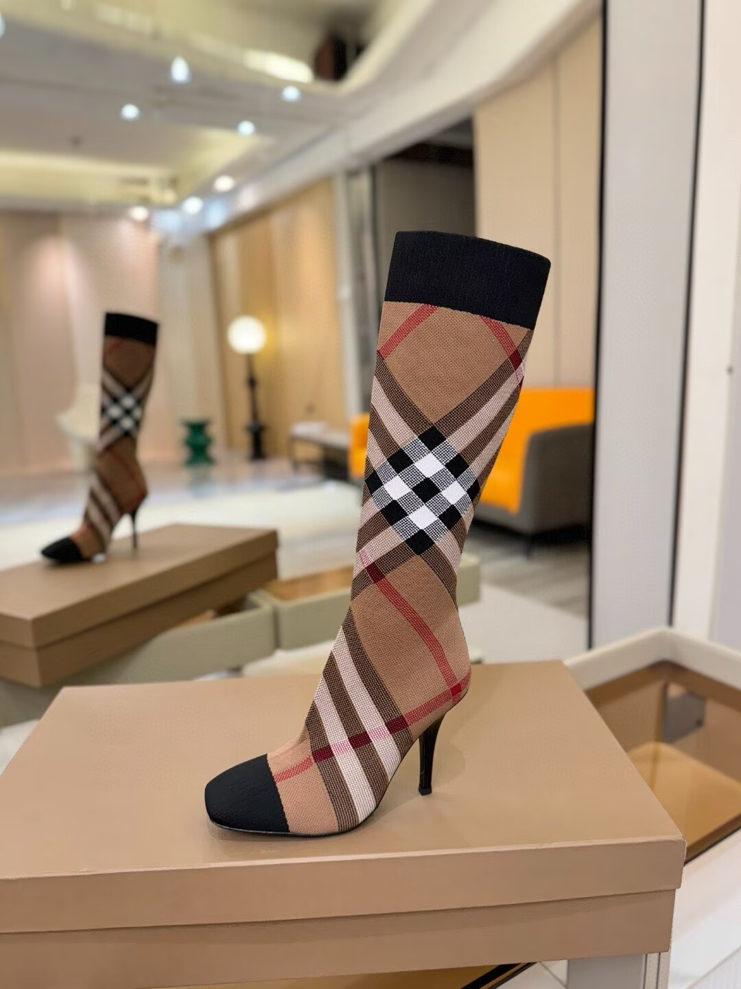 ua B**rry check high boots