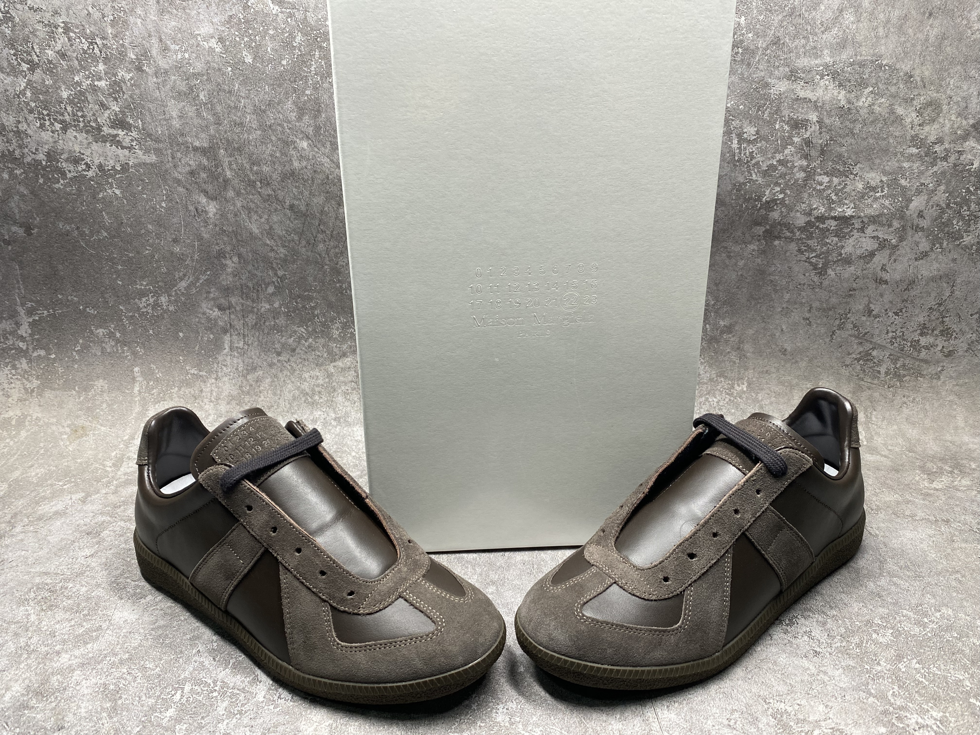 ua ma*s*n Ma*i*la mm6 sneakers
