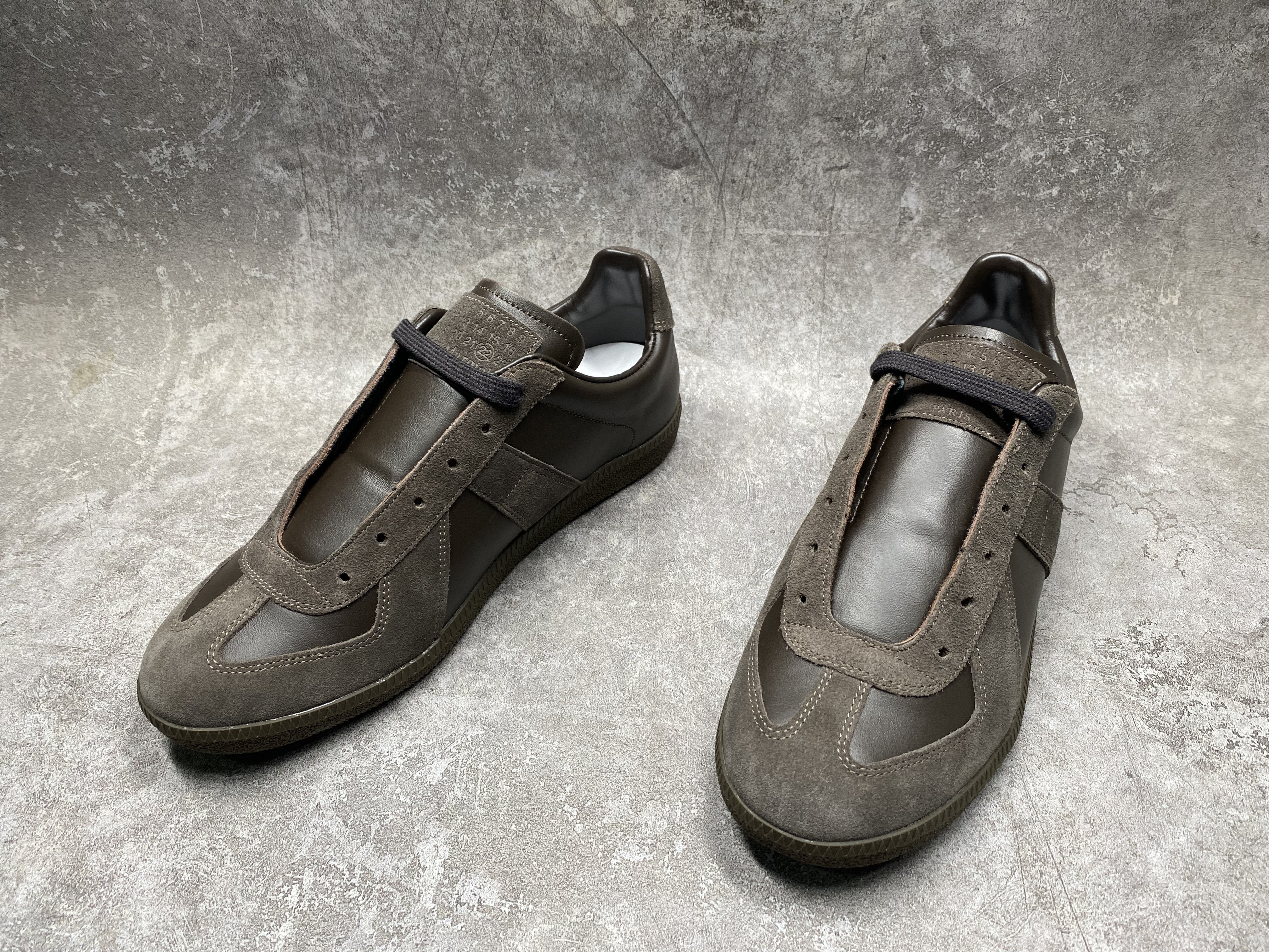 ua ma*s*n Ma*i*la mm6 sneakers