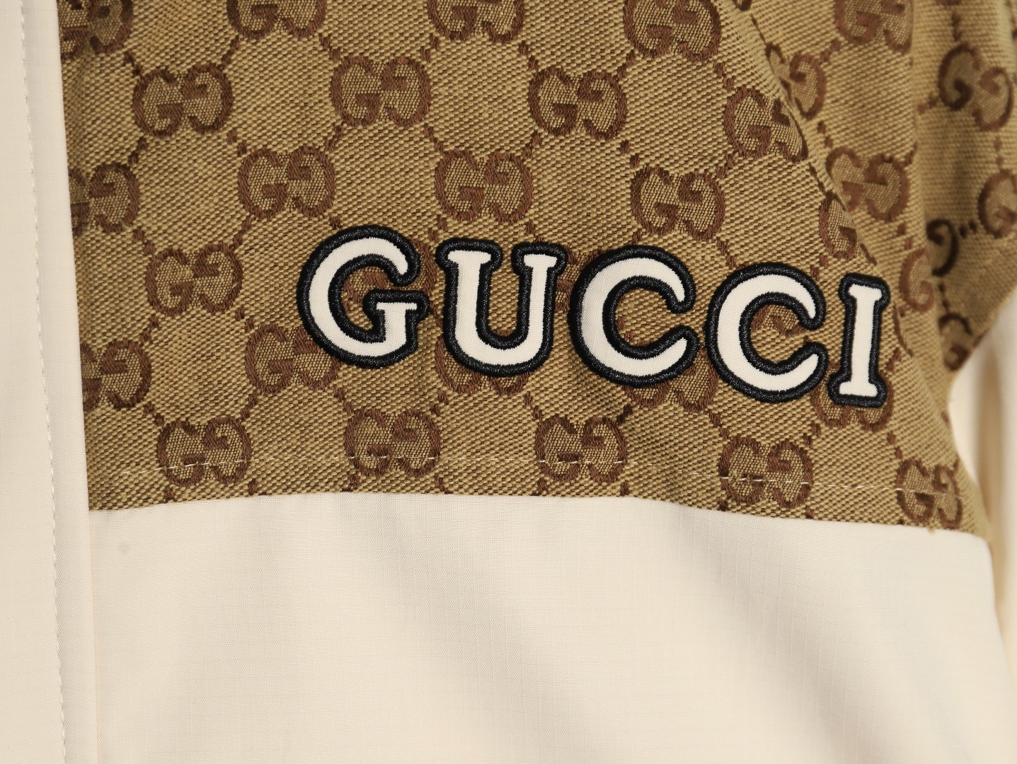 G*u*i Coats