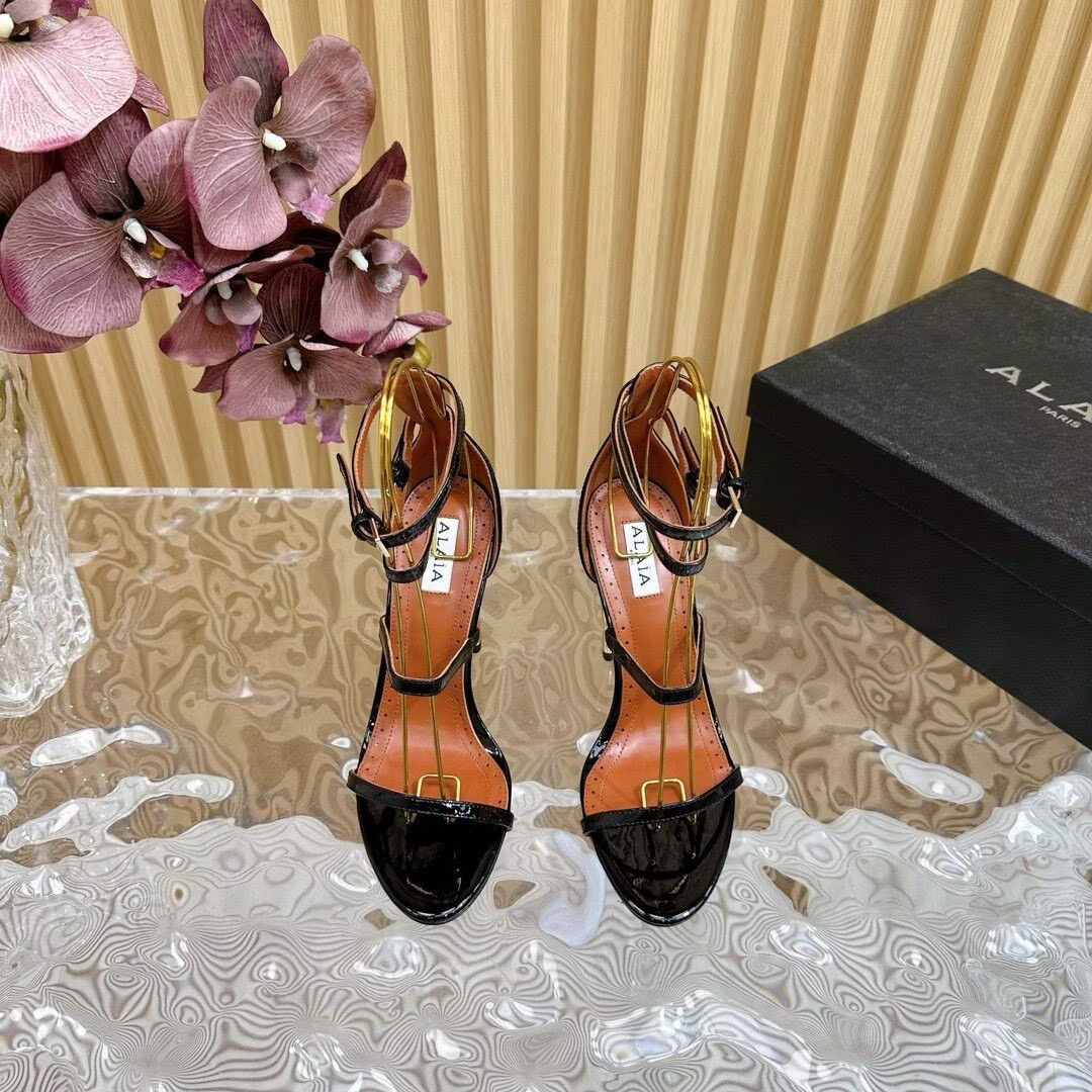 UA Alaïa Cabaret Patent Leather Sandals