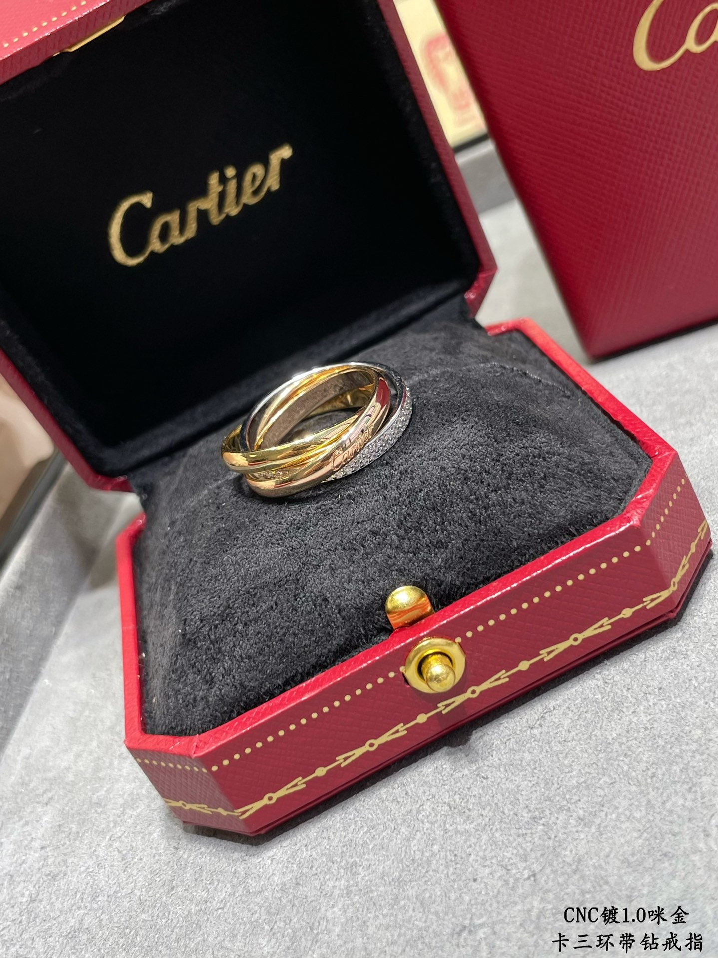 Ca*t*er three-band diamond ring