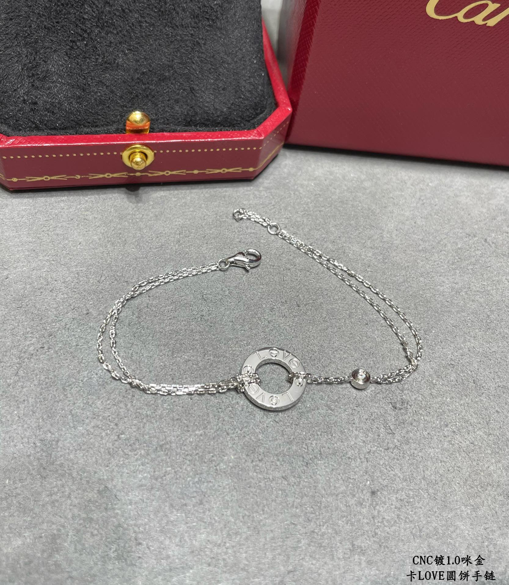 Ca*t*er Double-sided coin Bracelet