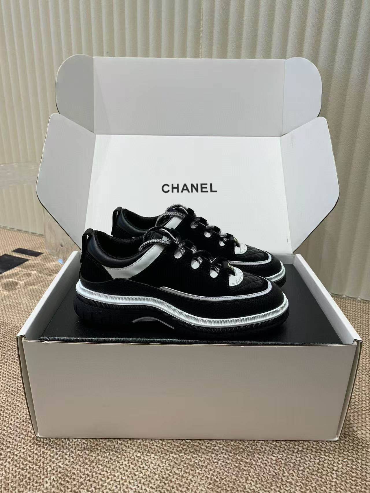 UA Ch*el Sneaker