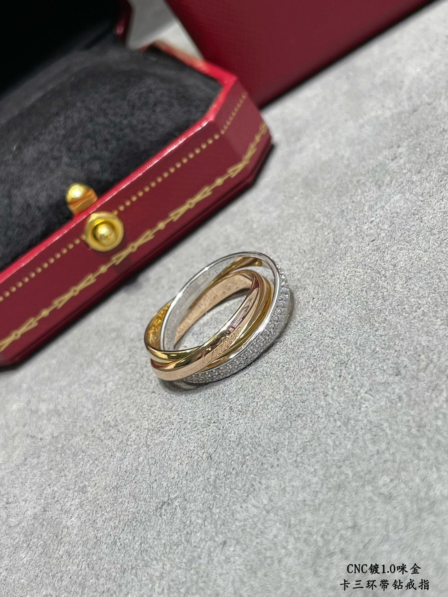 Ca*t*er three-band diamond ring