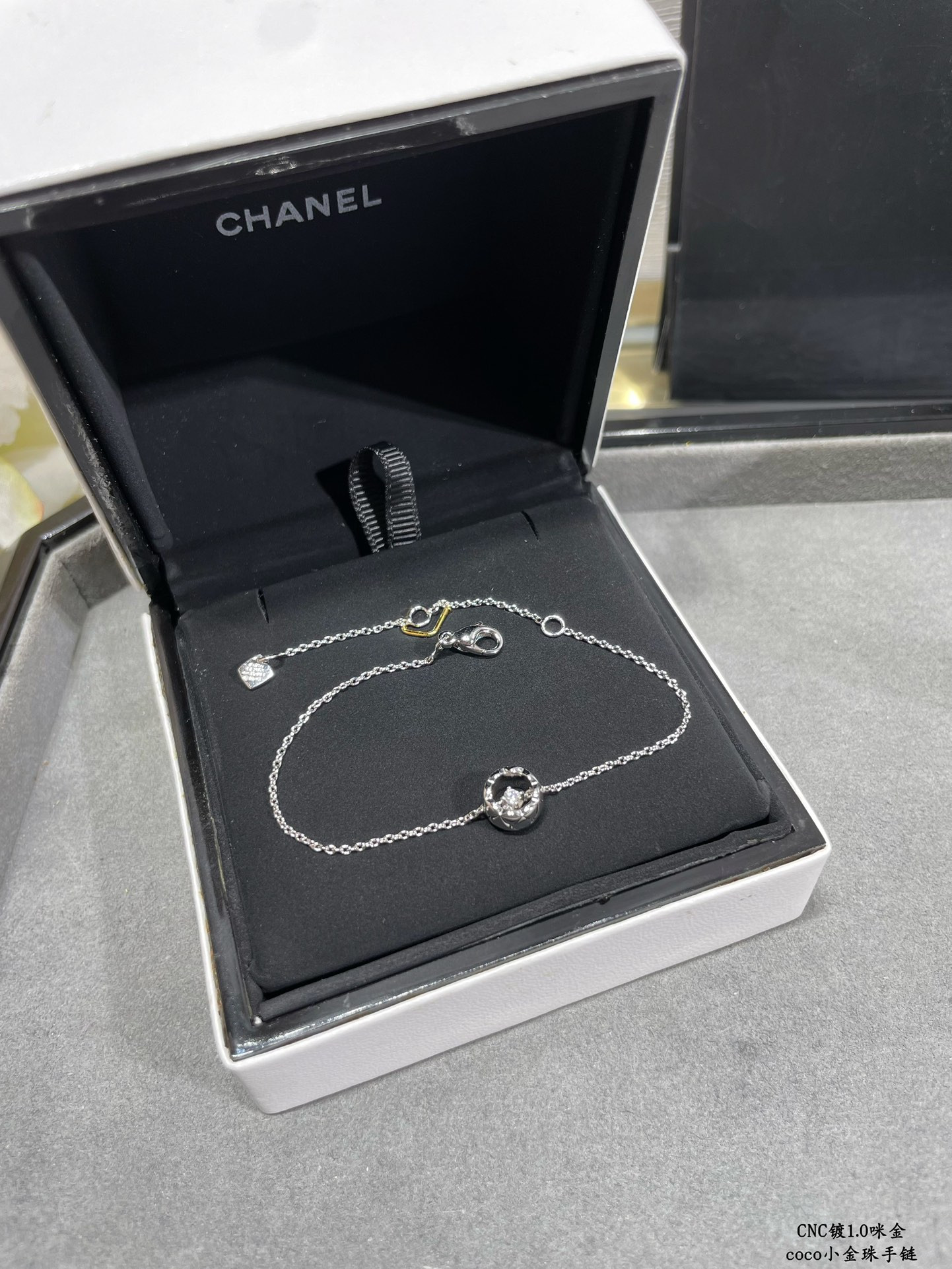 Ch*el Carved diamond-shaped gold bead Bracelet