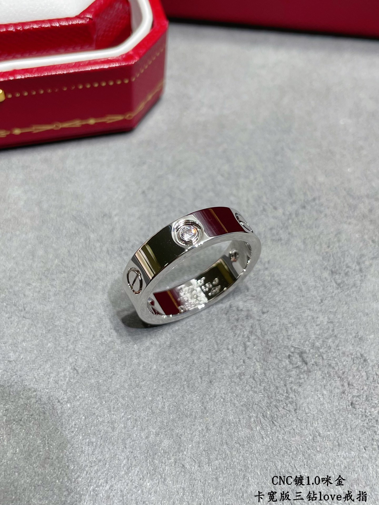 Ca*t*er Wide version three-diamond LOVE Ring