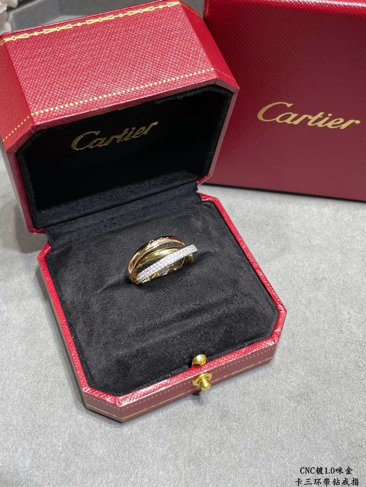Ca*t*er three-band diamond ring