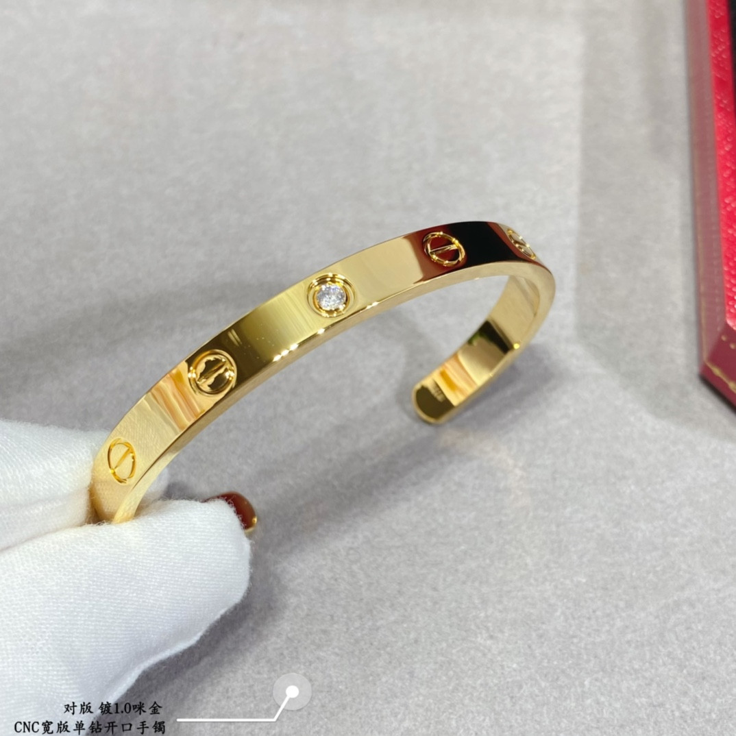 Ca*t*er wide single diamond open LOVE Bracelet