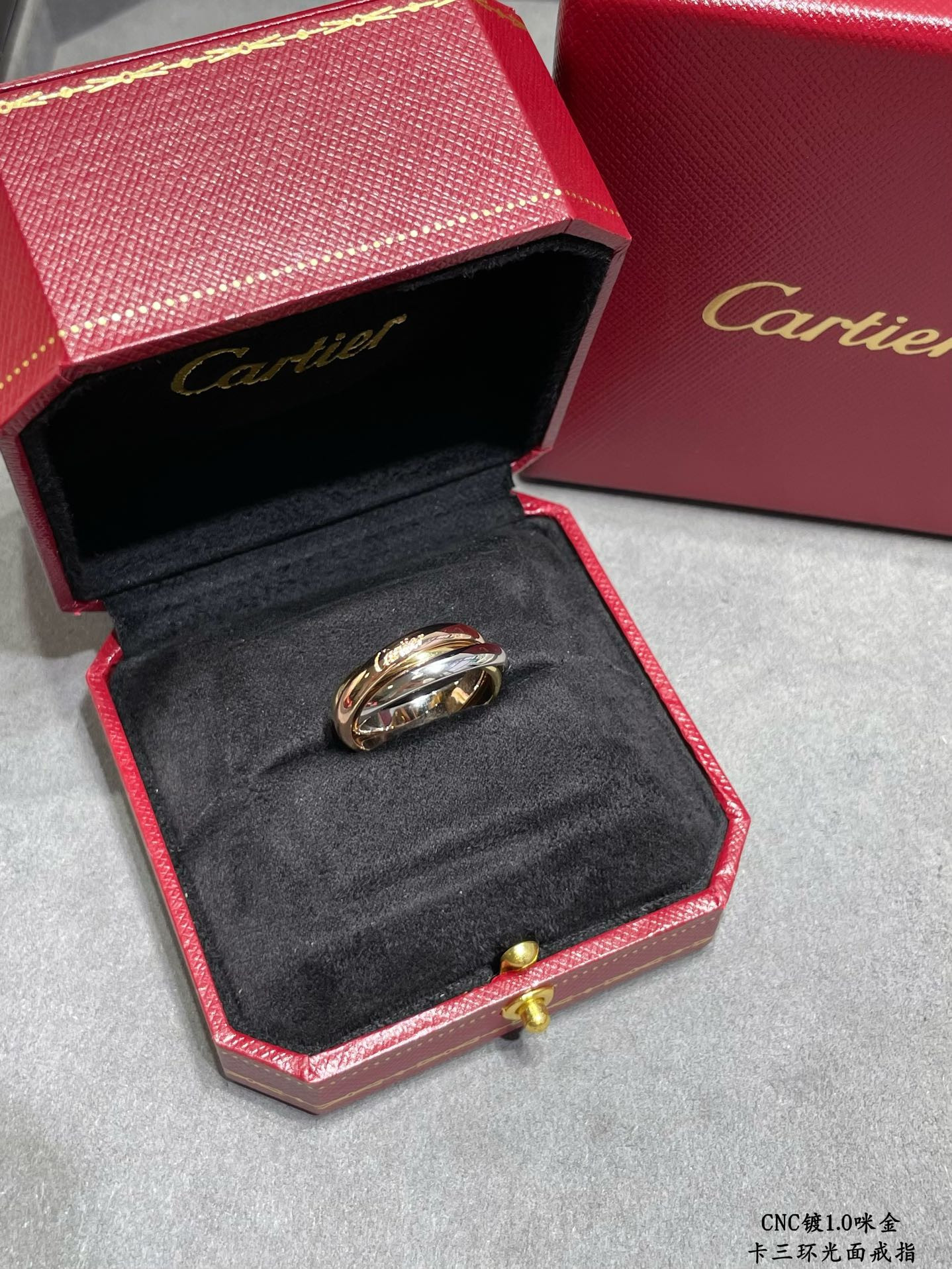 Ca*t*er three-ring polished ring