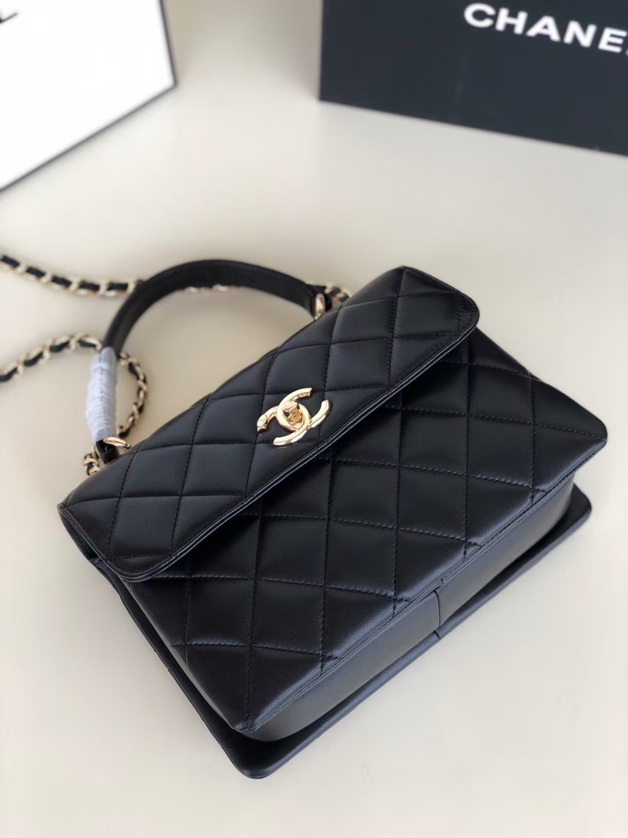 Ch*el flap bag with top handle 6.6 × 9.8 × 4.7 in