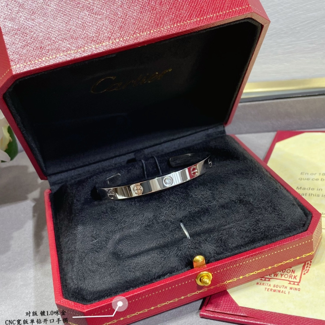Ca*t*er wide single diamond open LOVE Bracelet
