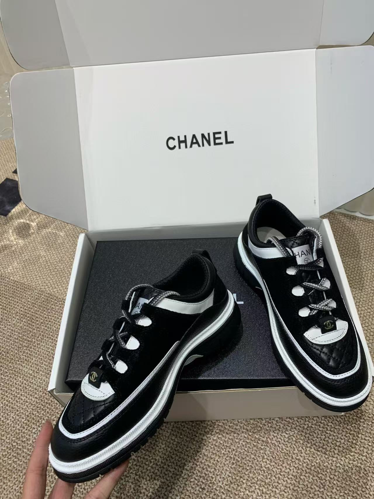 UA Ch*el Sneaker