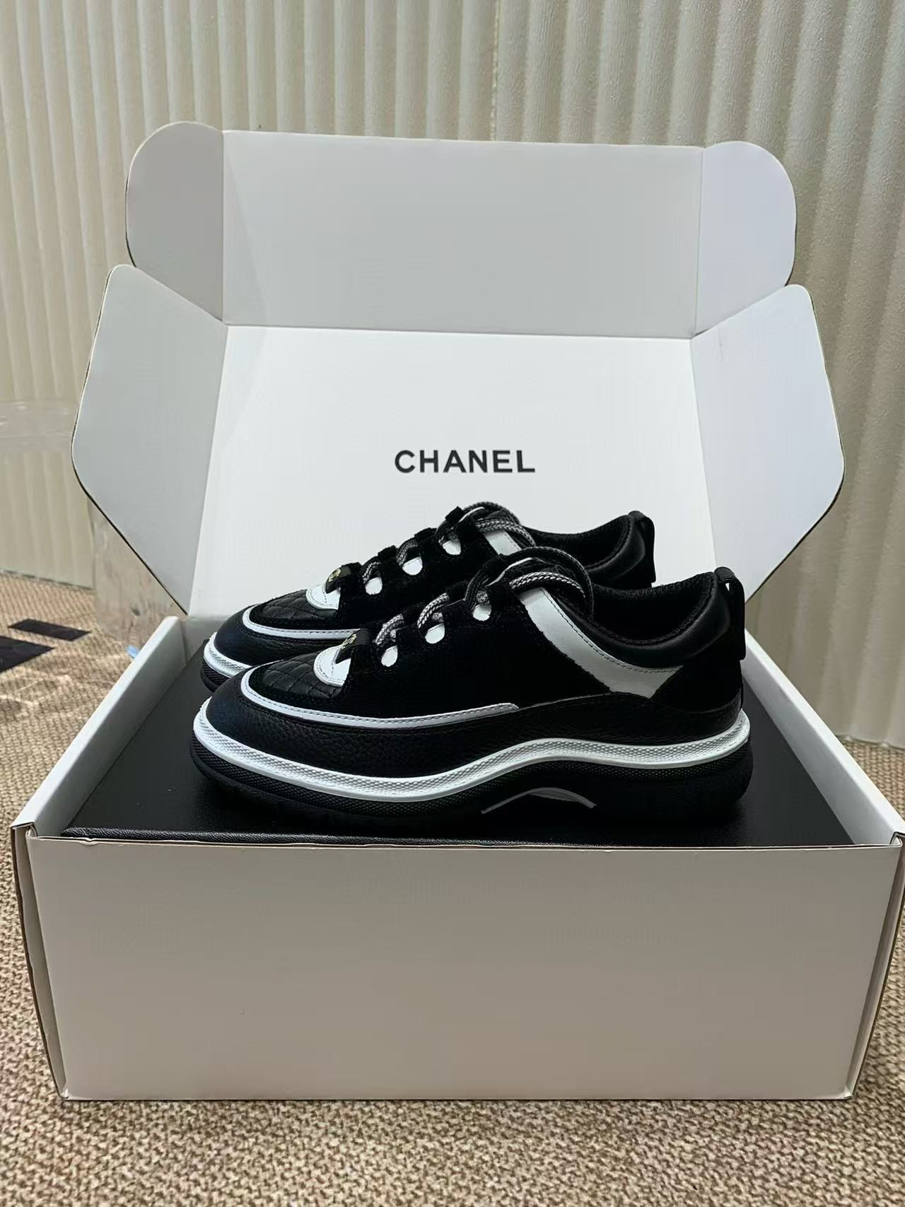 UA Ch*el Sneaker