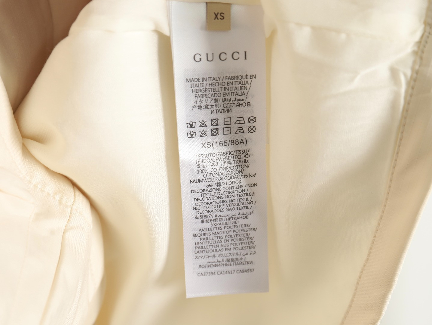 G*u*i Coats