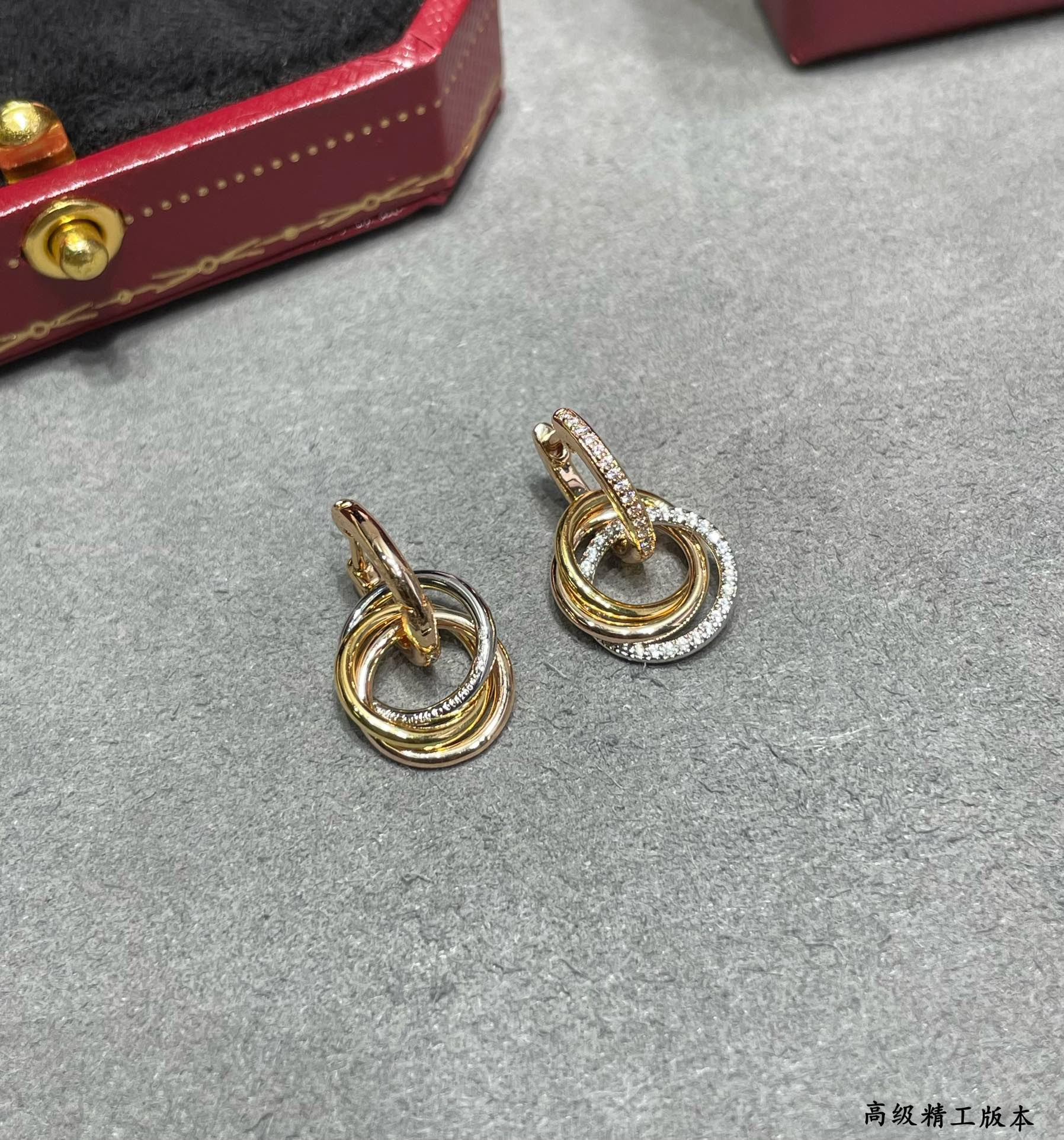 Ca*t*er Small size triple-ring diamond Earrings
