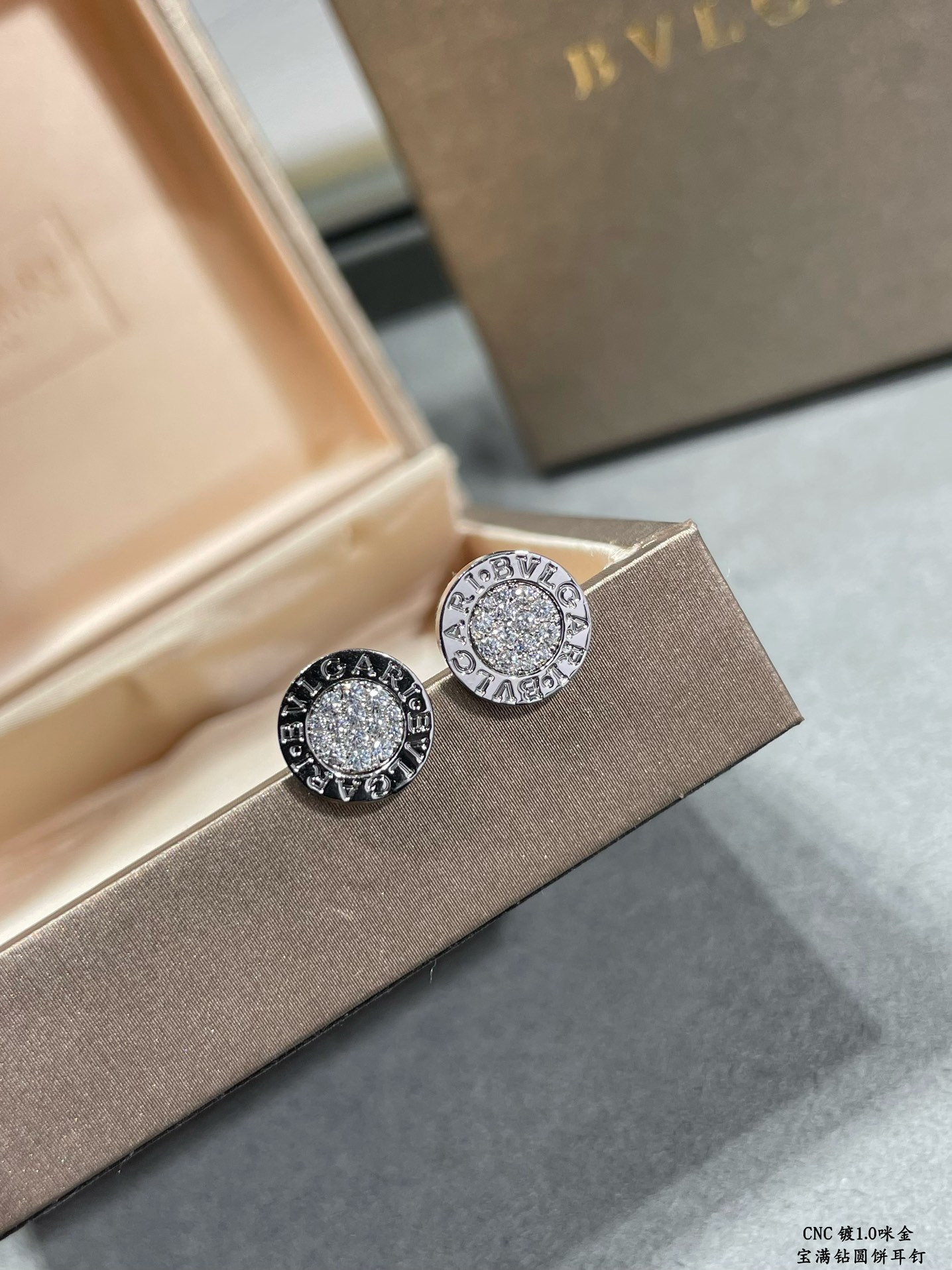 B*l*ai Diamond round cake Earrings