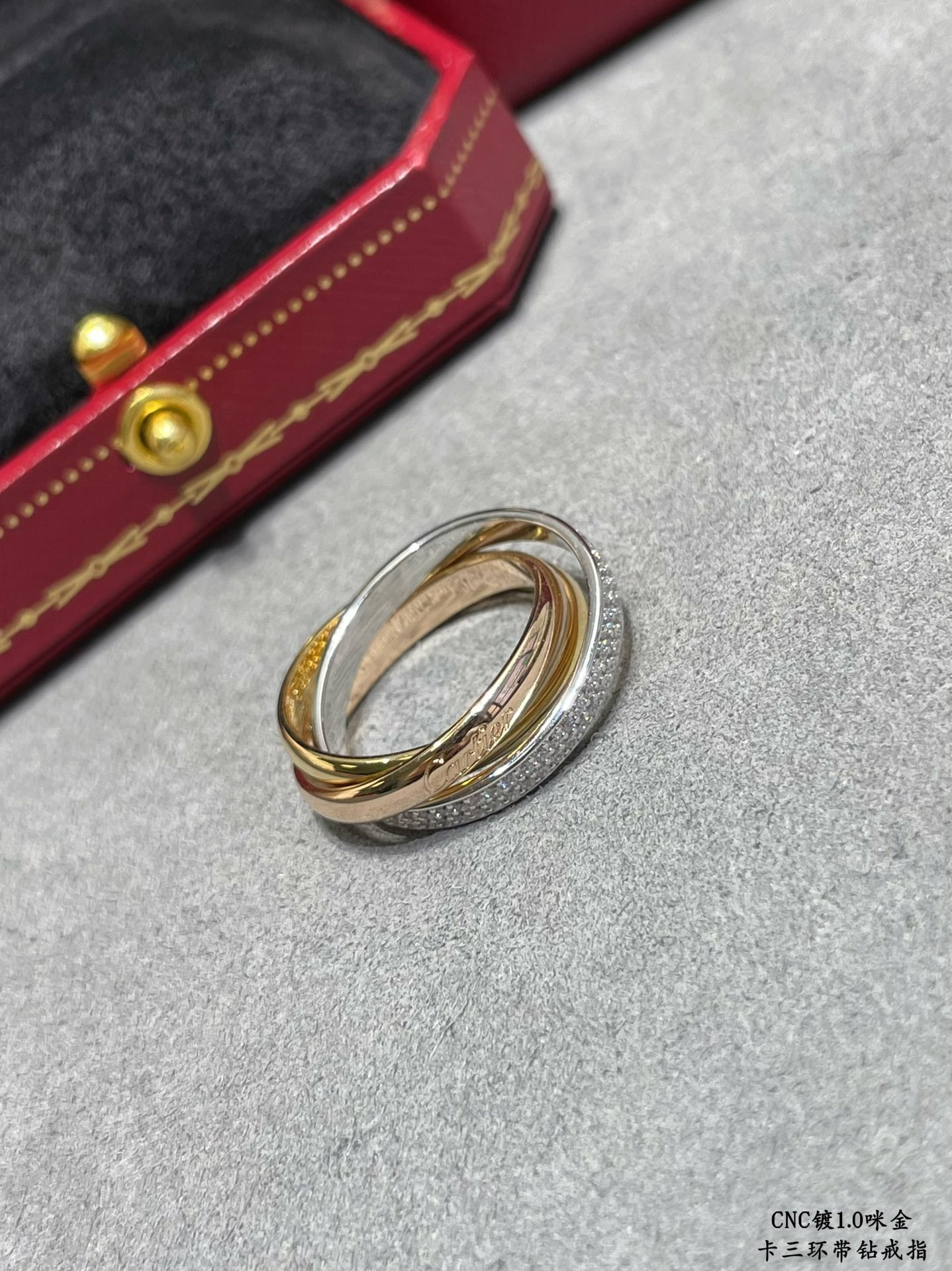Ca*t*er three-band diamond ring