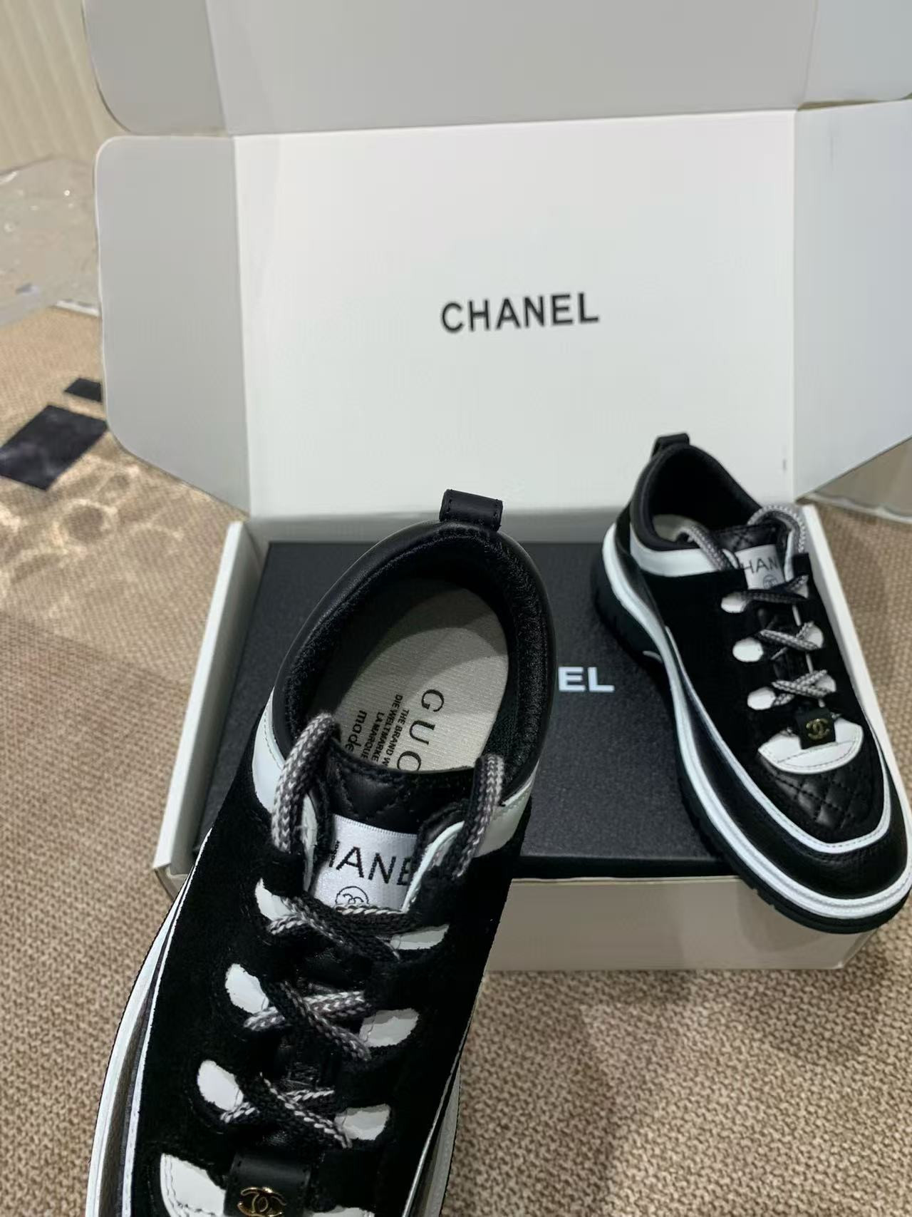 UA Ch*el Sneaker