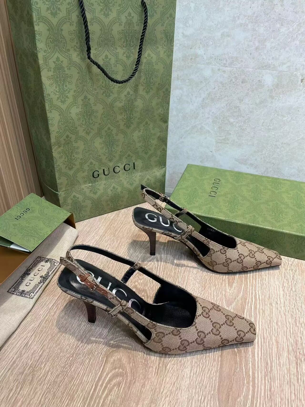 UA G*u*i GG Slingback Pump