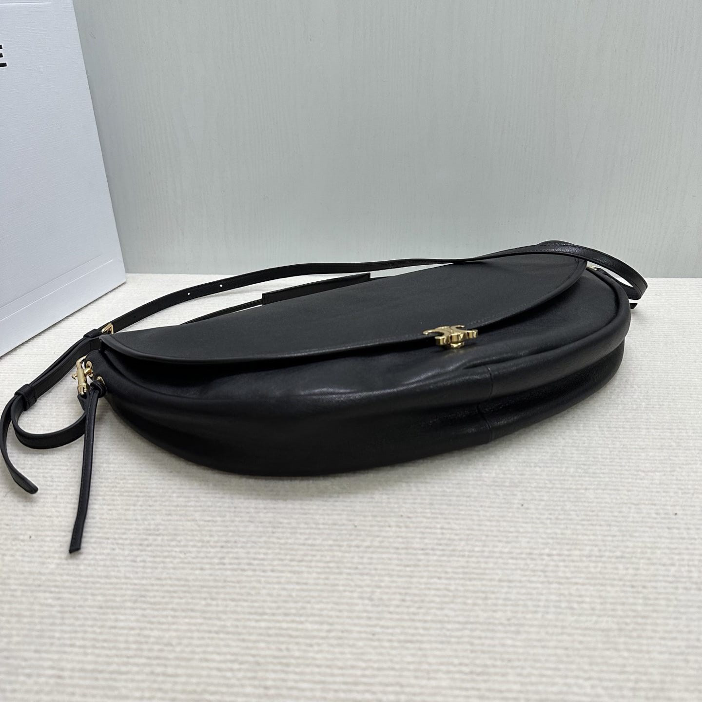 ce**e halfmoon soft triomphe bag in S*pple shiny lambskin 46x19x10cm