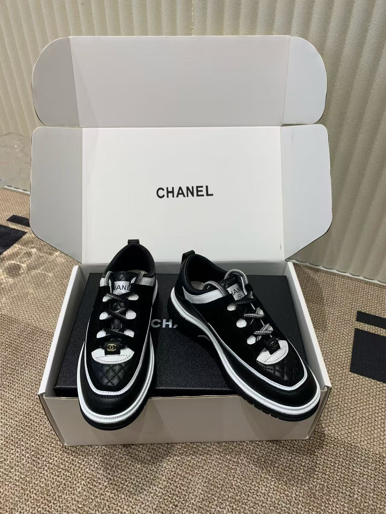 UA Ch*el Sneaker