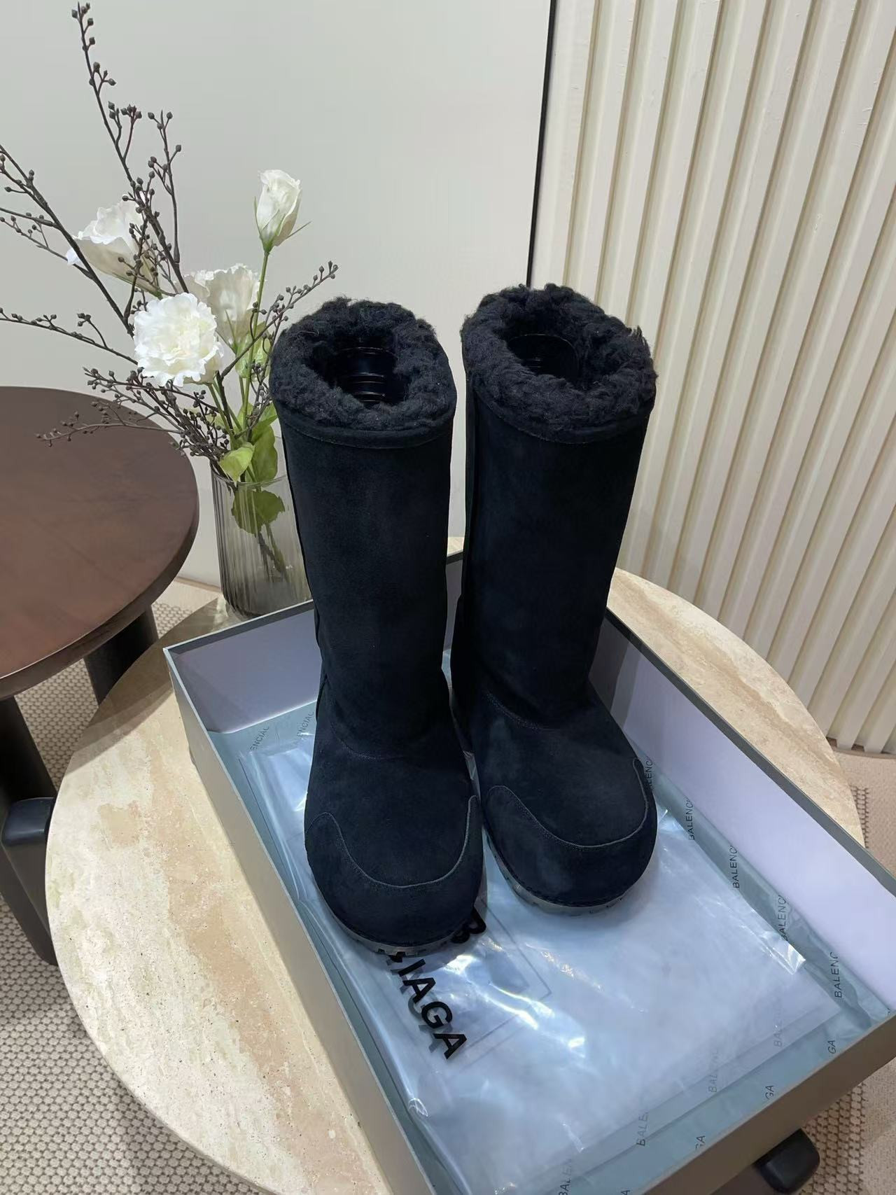 UA Ba*len*cia*ga Snow Boots