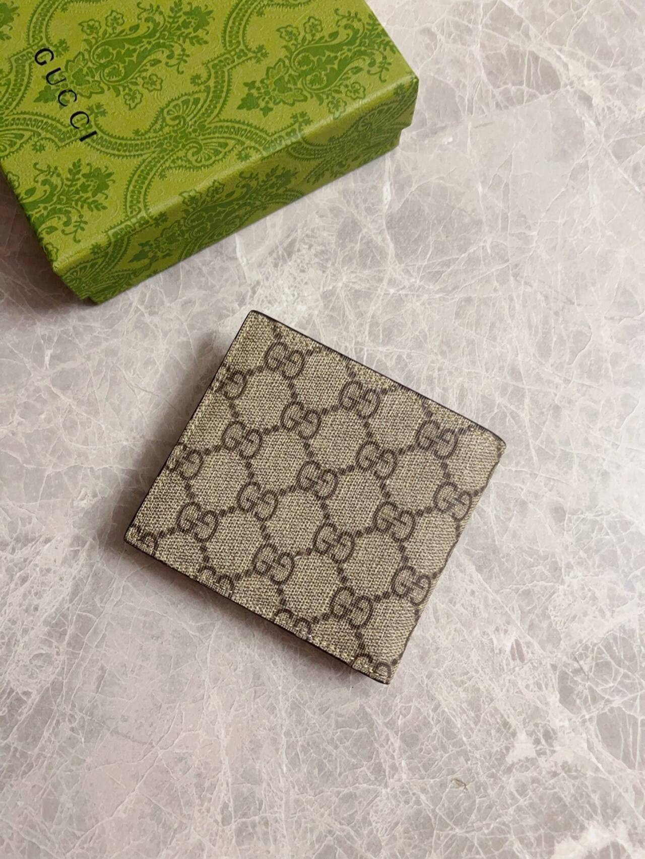 G*u*i brown interior gg bi-fold wallet 10x8.9cm