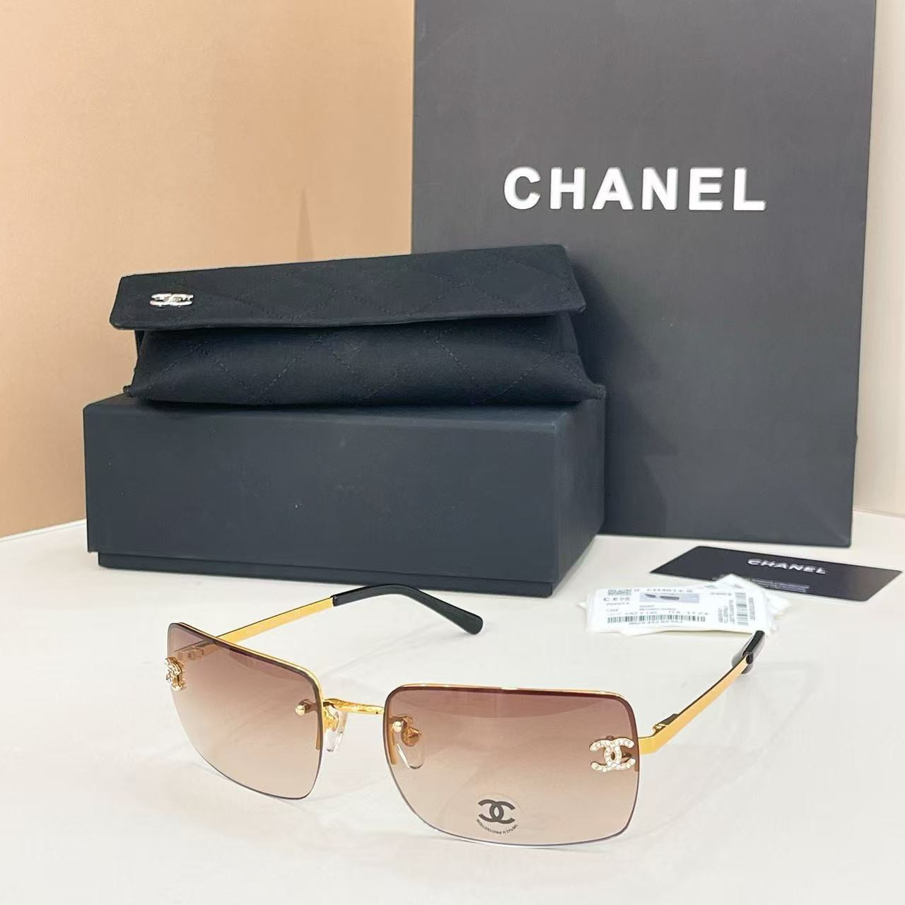 Ch*el crystal logo glasses