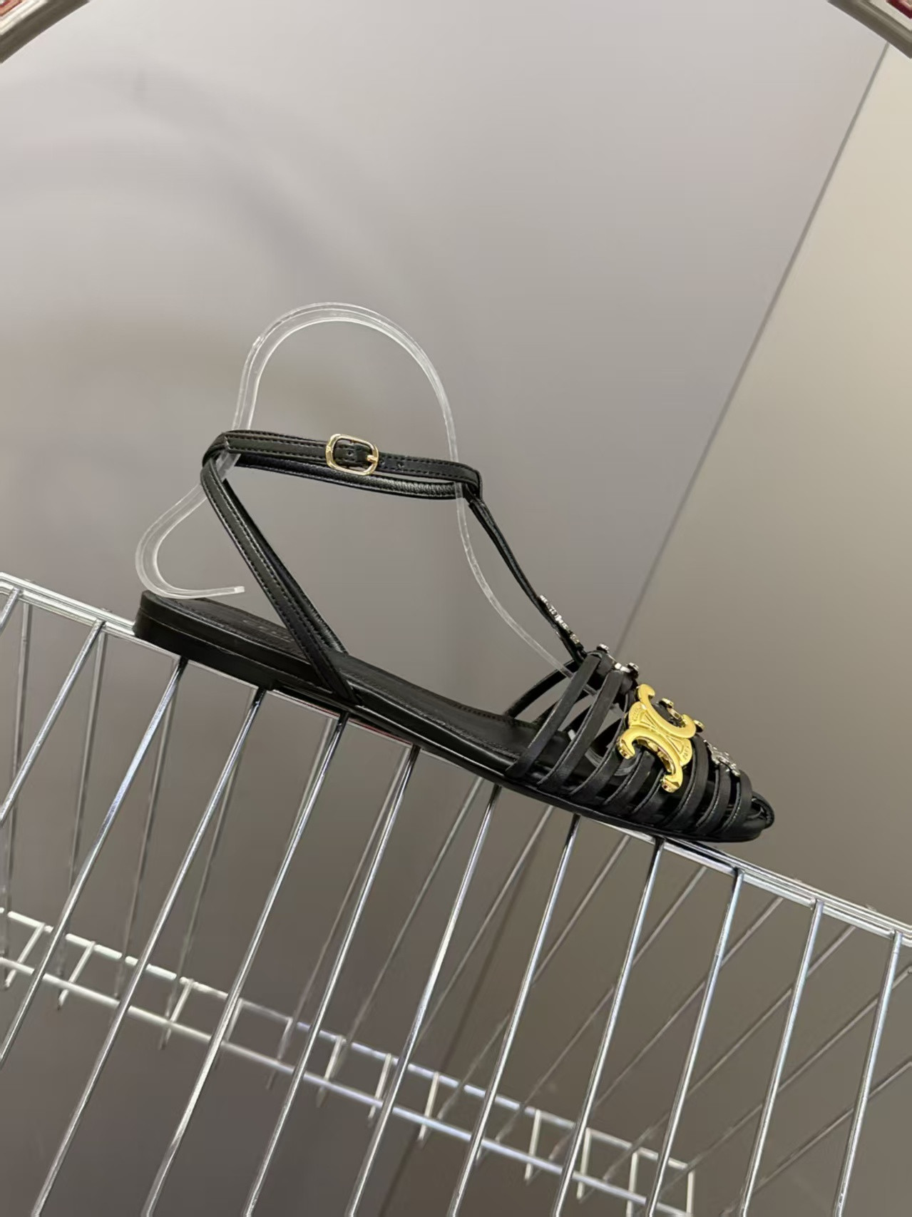ua Ce**e cage flat sandal