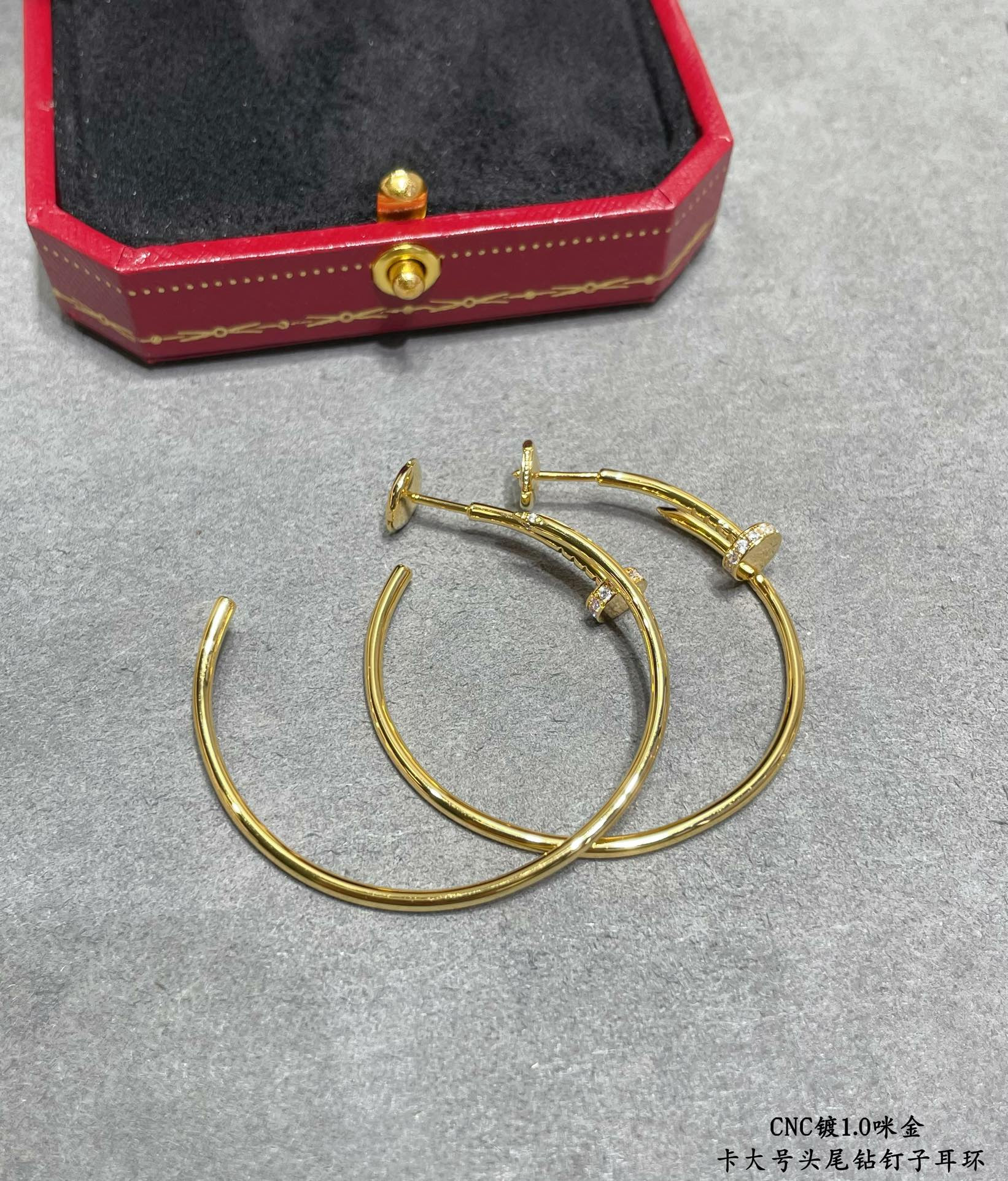Ca*t*er Large size head and tail diamond nail Earrings