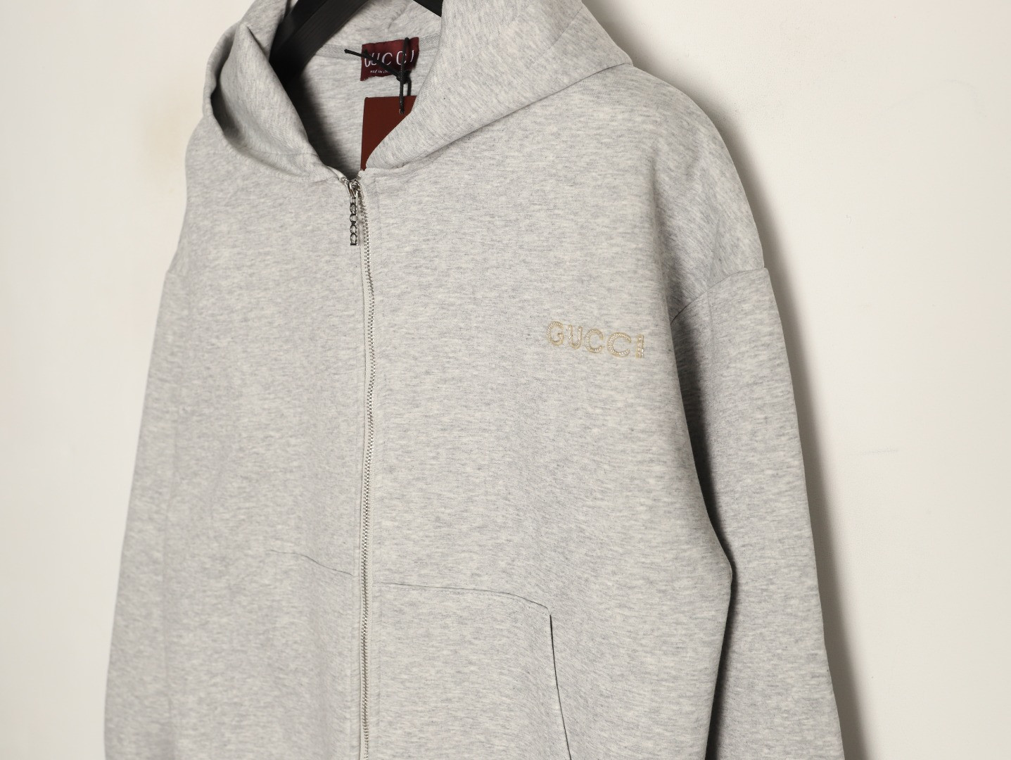 G*u*i coats