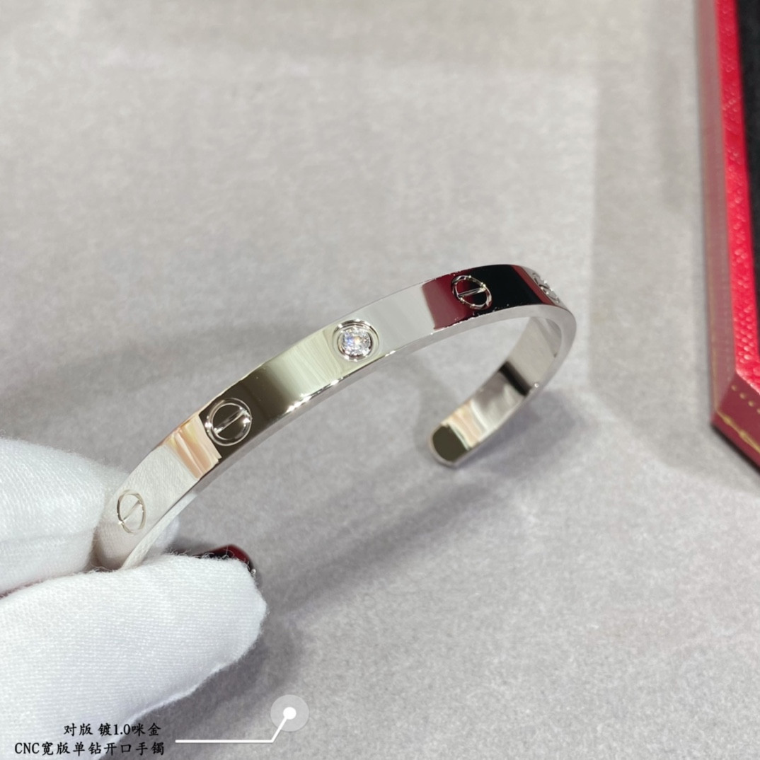 Ca*t*er wide single diamond open LOVE Bracelet