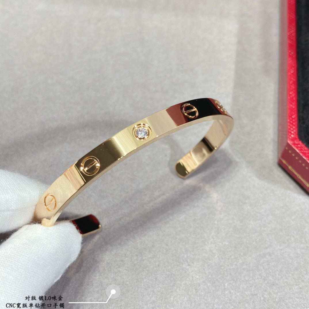 Ca*t*er wide single diamond open LOVE Bracelet
