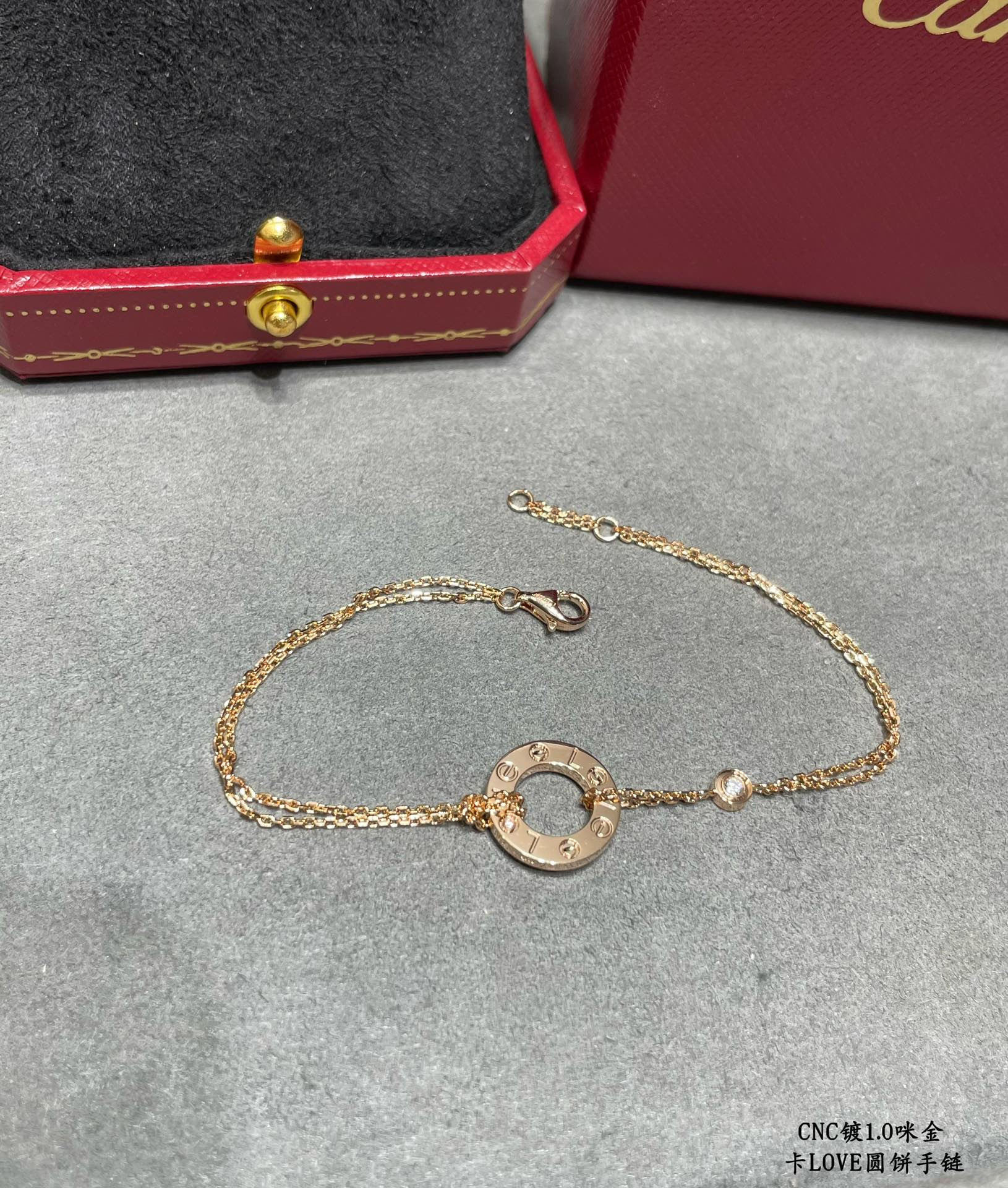 Ca*t*er Double-sided coin Bracelet