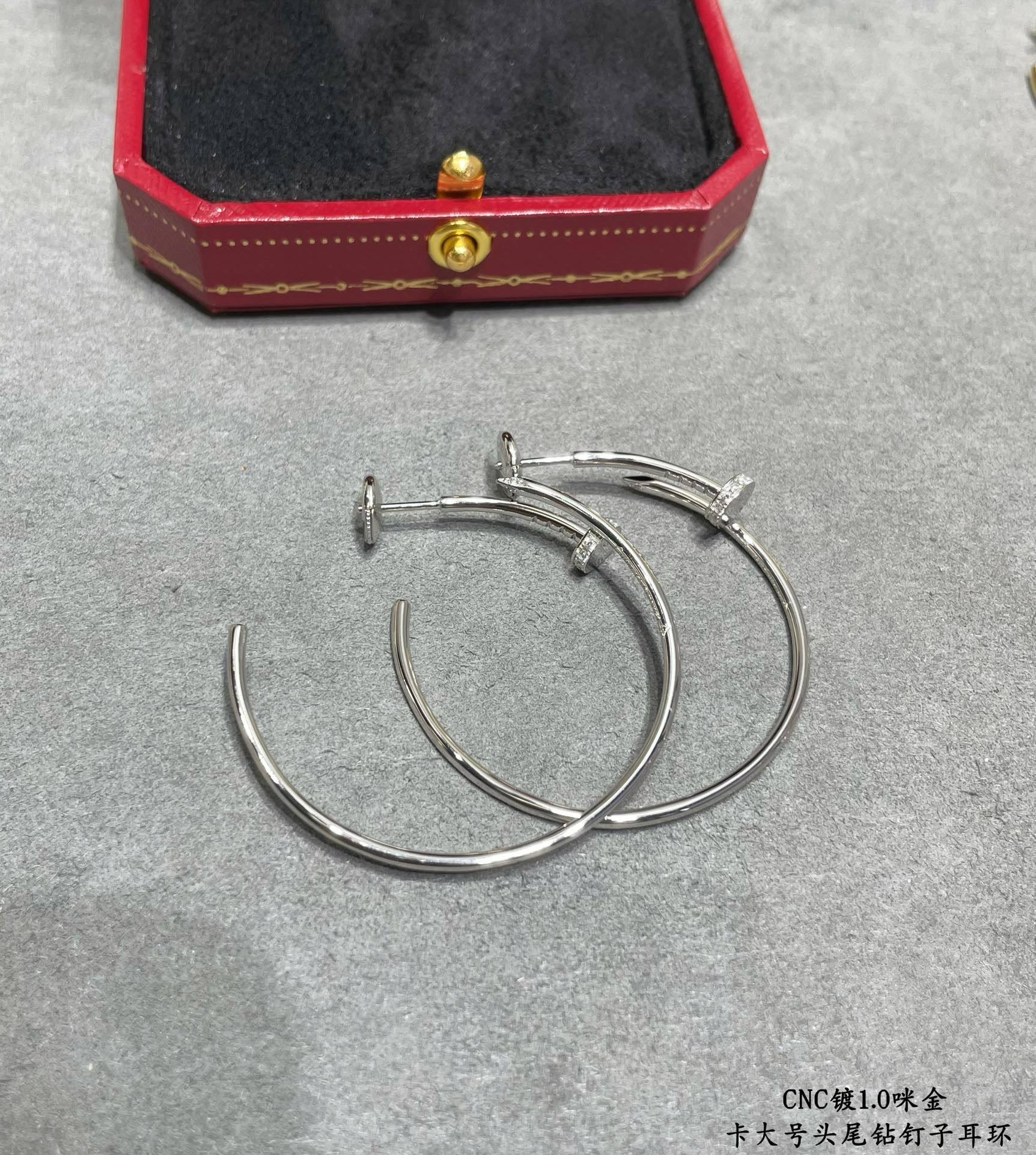 Ca*t*er Large size head and tail diamond nail Earrings