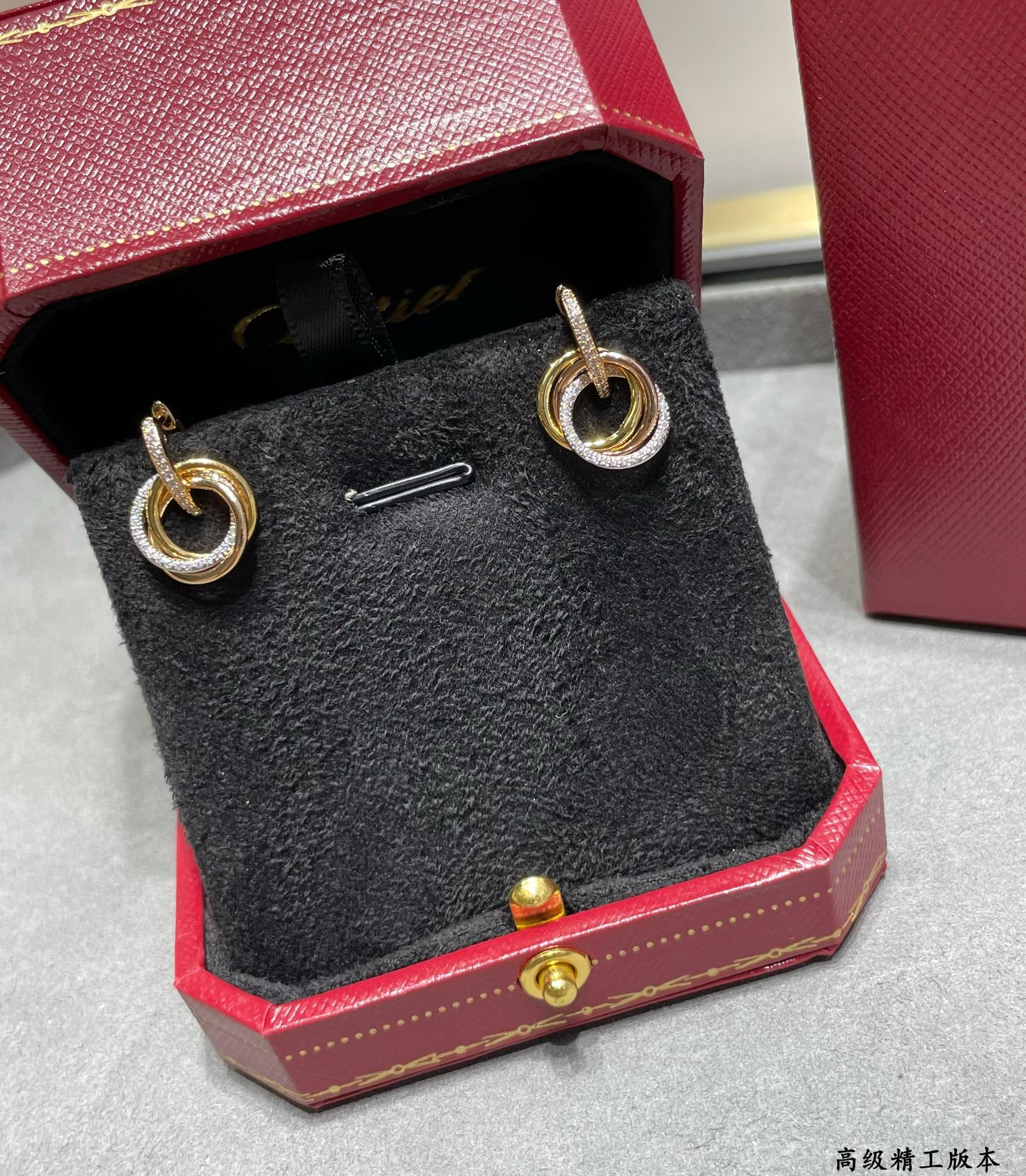 Ca*t*er Small size triple-ring diamond Earrings