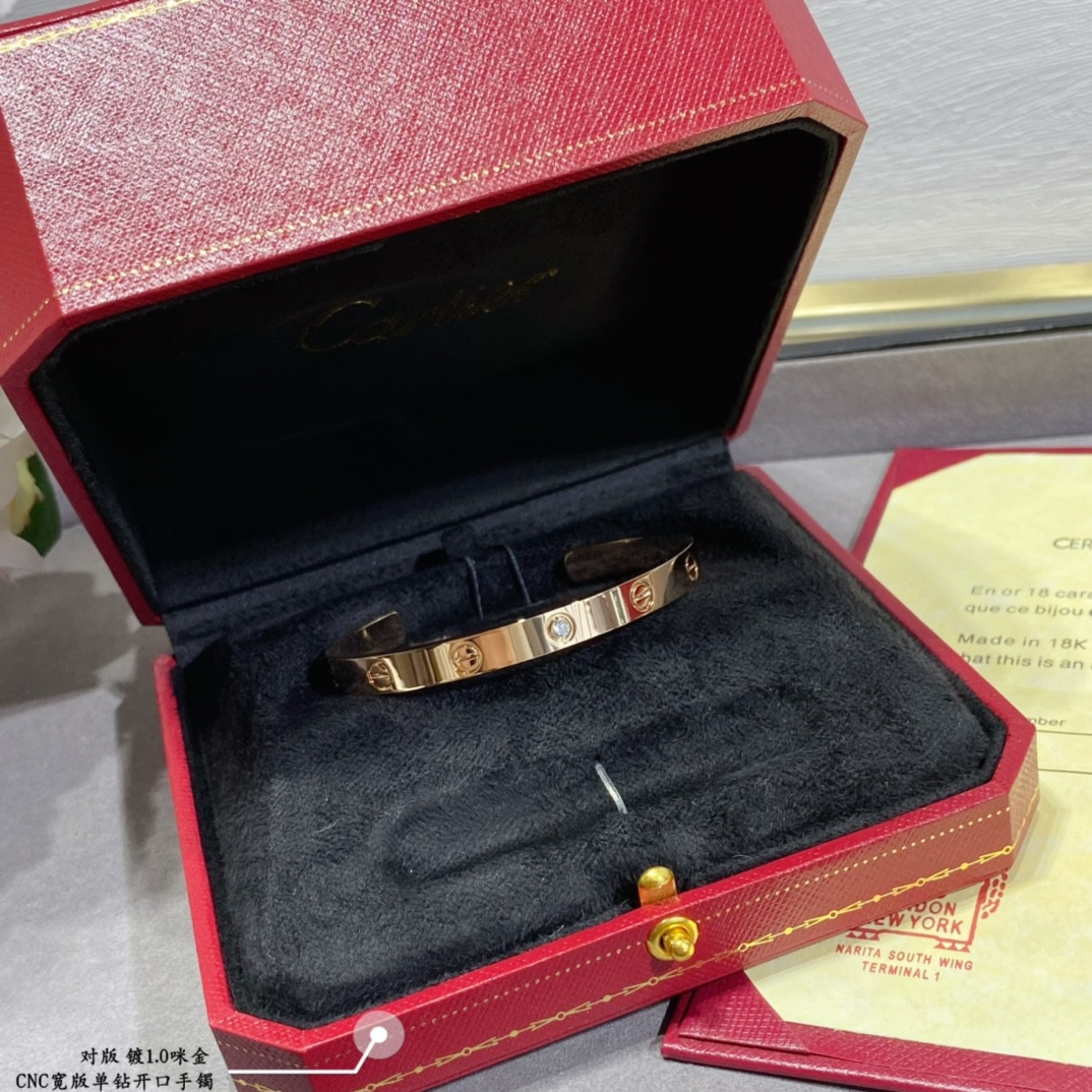 Ca*t*er wide single diamond open LOVE Bracelet