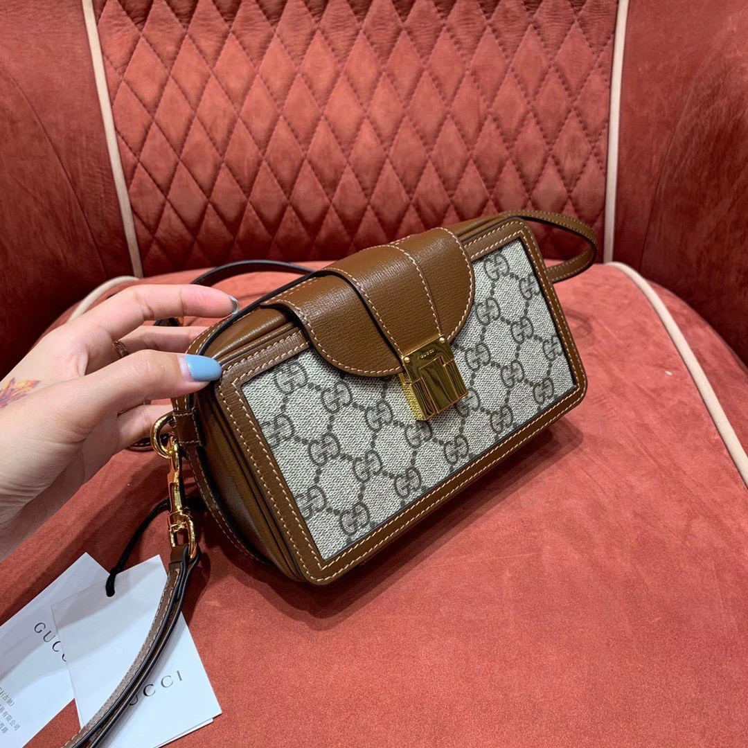 G*u*i GG mini bag with clasp closure