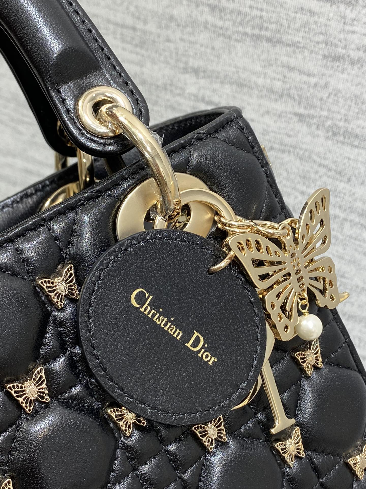 SMALL LADY D*0r Black with Butterfly Studs