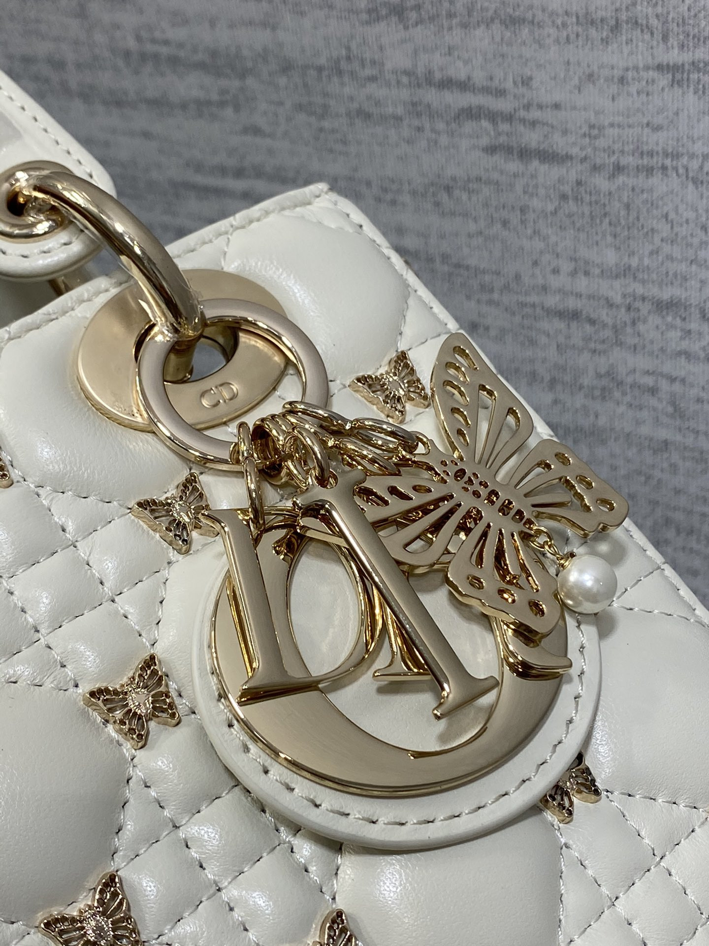 SMALL LADY D*0r White with Butterfly Studs