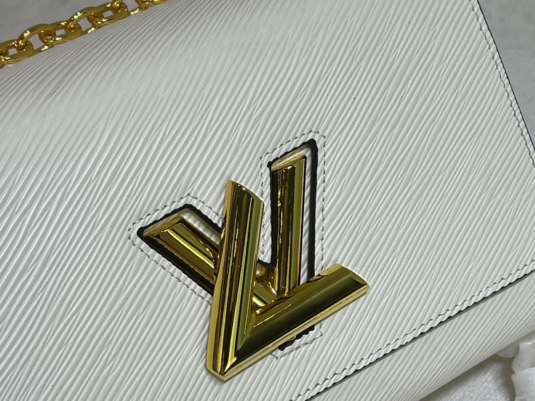L0*is V*t0n Twist MM white 9.1 x 6.7 x 3.7 inches