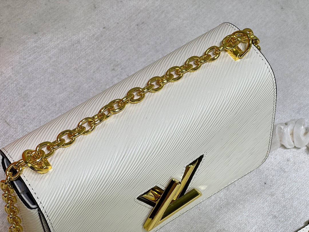 L0*is V*t0n Twist MM white 9.1 x 6.7 x 3.7 inches