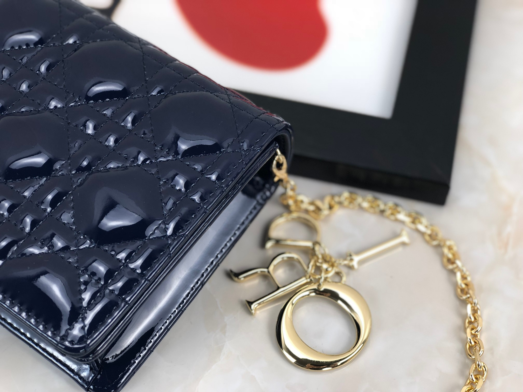 Lady D*0r Pouch Navy Patent Cannage Calfskin 8.5 x 4.5 x 1 inches