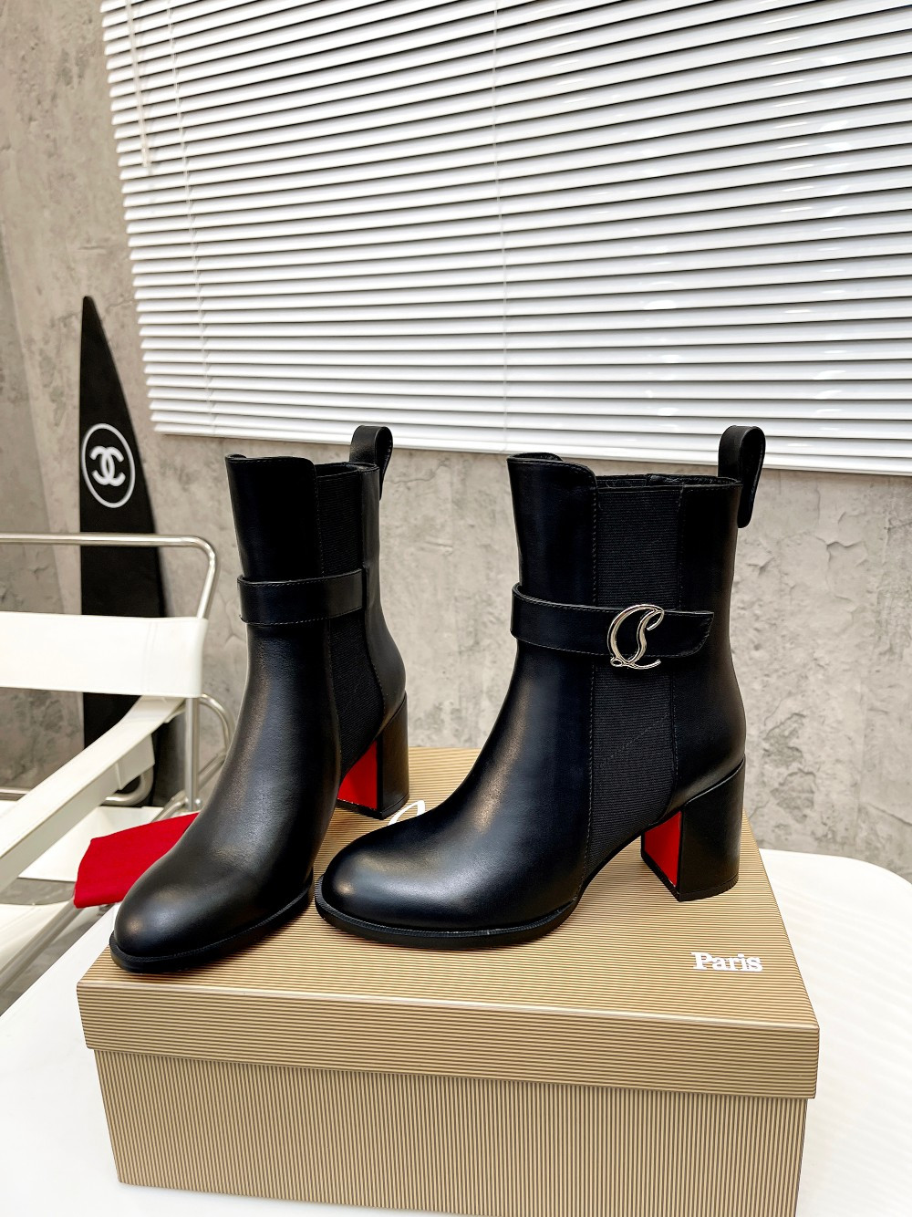 UA Ch**an Louboutin (CL) launched a new collection of chunky heeled platform boots